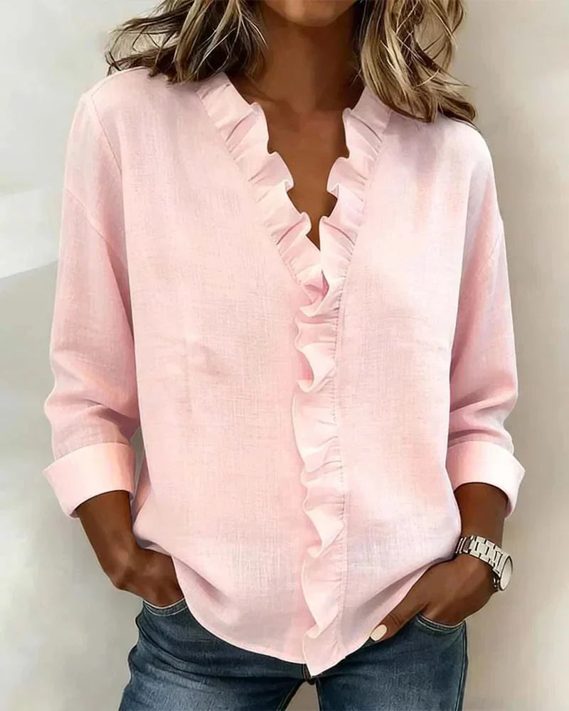 Women's lightweight ruffled V-neck blouse, perfect for spring/summer, offers elegant, casual chic style.