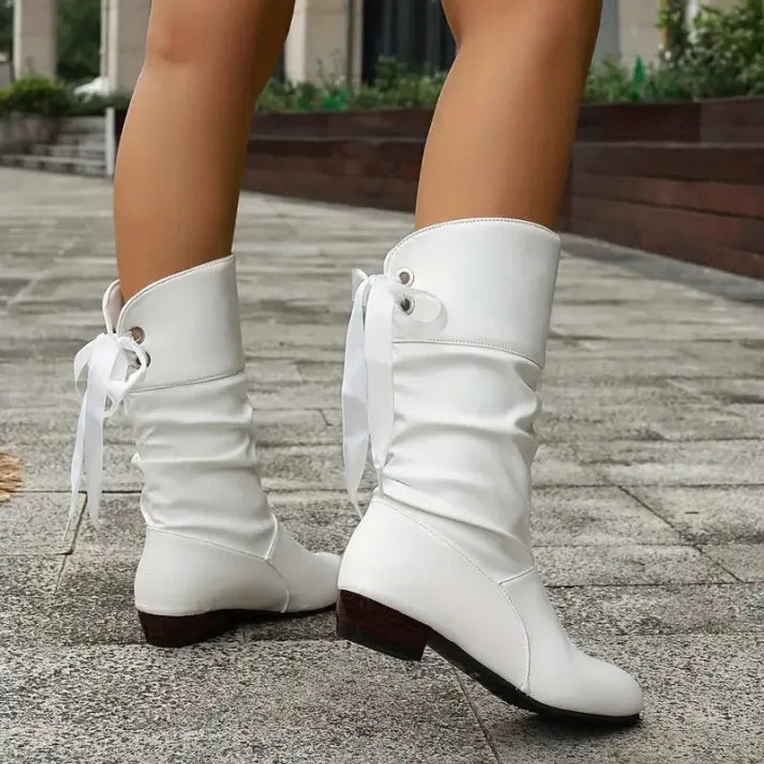Vibrant red women's slouchy lace-up ankle boots with a stylish block heel for bold looks.