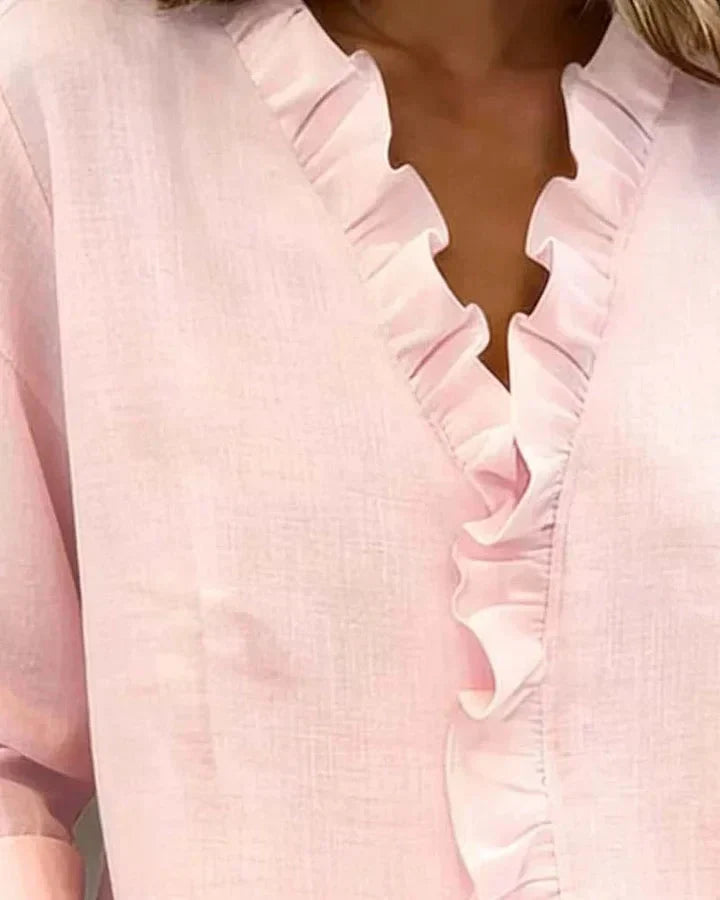 Feminine women's V-neck blouse, lightweight with stylish ruffles, an elegant choice for spring/summer fashion.