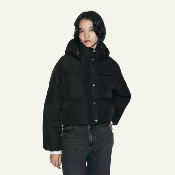 Women's black puffer jacket, lightweight & warm, perfect for winter cold weather.