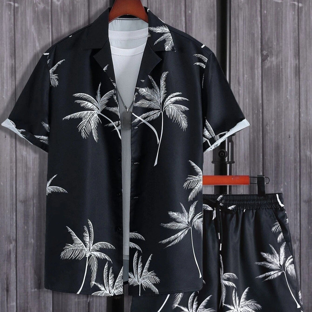 Stylish men's two-piece tropical summer set with printed shirt & matching shorts for resort wear.