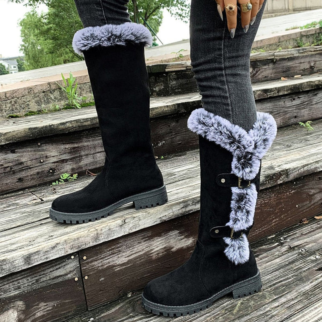 Elegant women's round toe knee-high boots, fur-trimmed & buckled, a stylish winter essential boot.