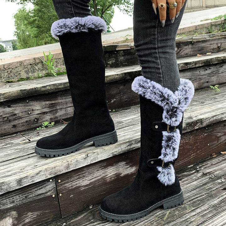 Elegant women's round toe knee-high boots, fur-trimmed & buckled, a stylish winter essential boot.