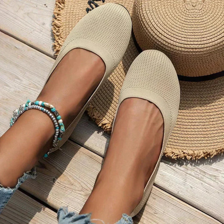 Women's wide-fit walking shoes, engineered for comfort, featuring slip-on convenience & arch support.
