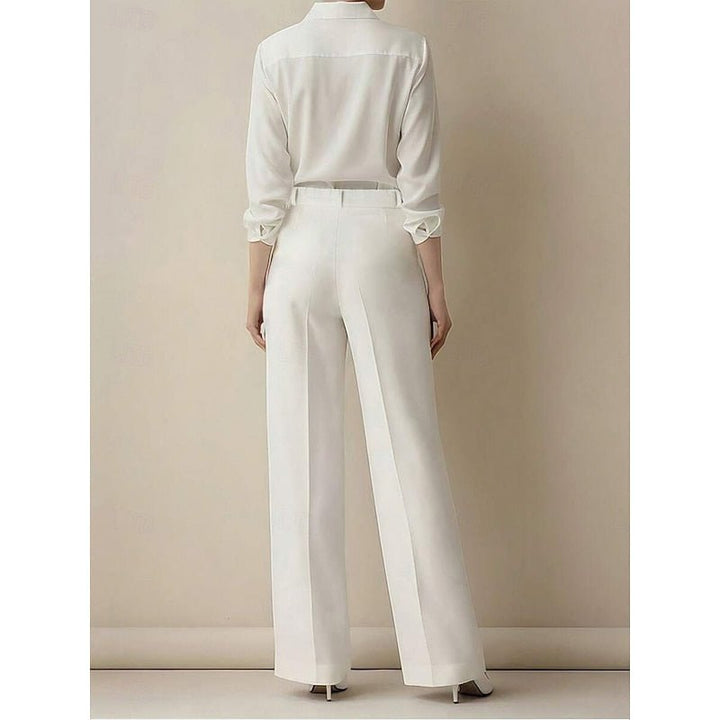 Flattering high-waist tailored women's trousers, ideal for an elegant silhouette and diverse occasions.
