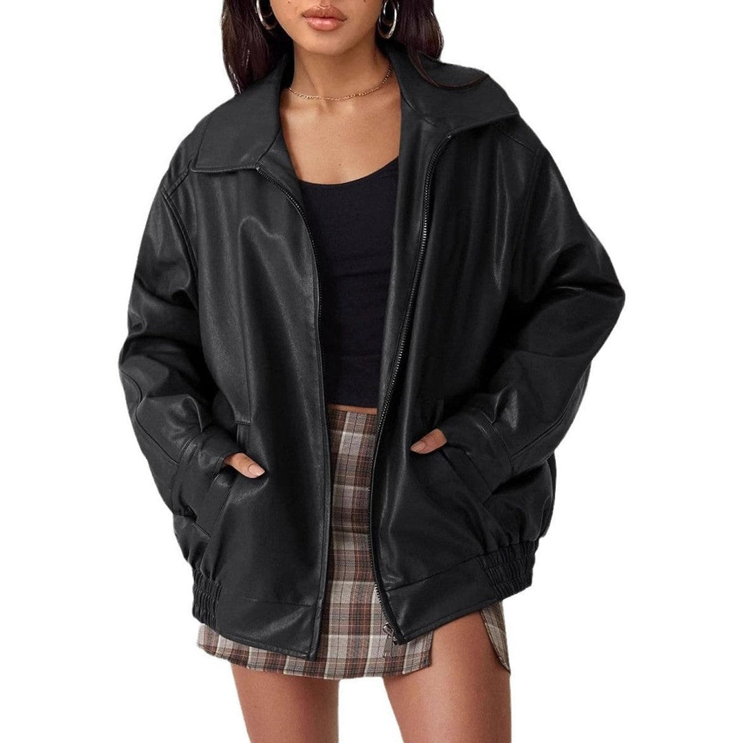 Trendy women's oversized leather bomber jacket, ideal for chic street style outerwear.