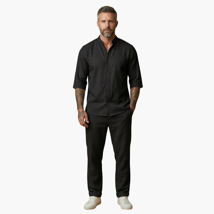 Men's two-piece relaxed fit set for summer. V-neck shirt and comfortable drawstring pants, great for casual wear.