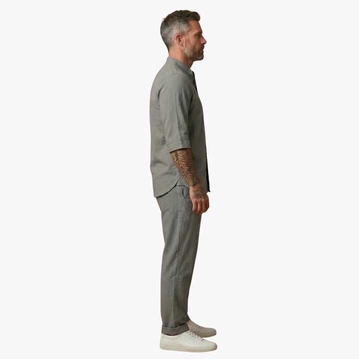 Stylish men's relaxed fit grey shirt & drawstring pants set. Ideal comfortable two-piece summer casual wear.