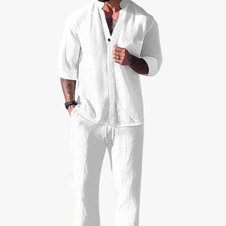 Comfy men's drawstring pants in black, included in a relaxed two-piece set with a V-neck shirt.