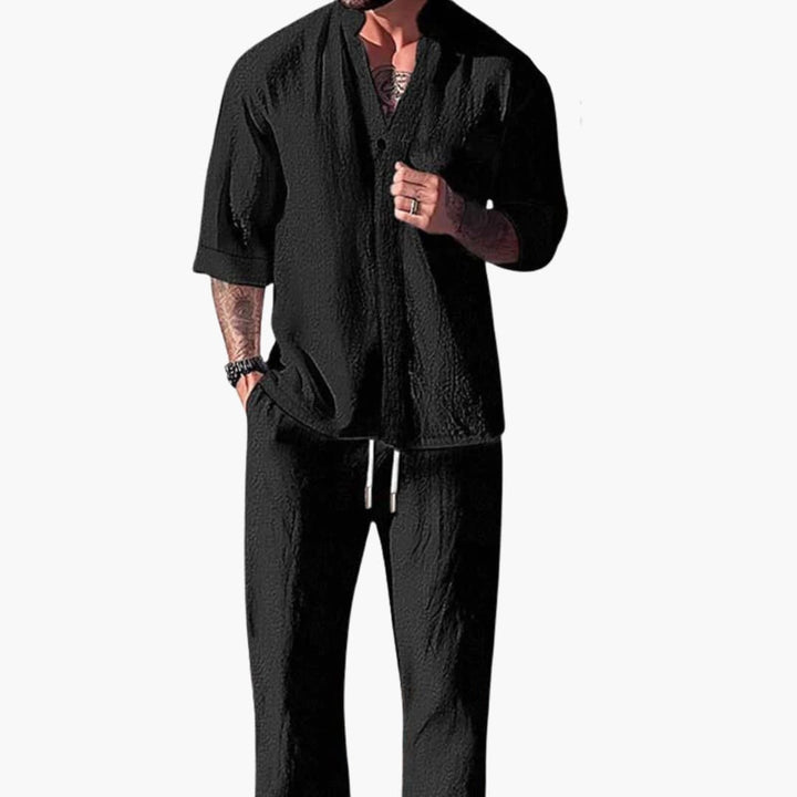 Casual men's fashion two-piece set: relaxed V-neck shirt & versatile drawstring pants. Great for any color.