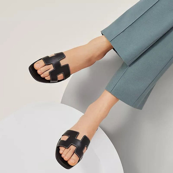Casual slip-on ladies' slippers with elegant design. Ideal comfort shoes for summer home.