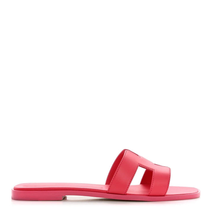 Fashionable women's summer travel essentials. Elegant comfort slip-on sandals.