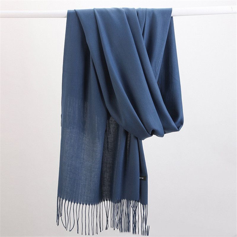 High-quality cashmere scarf, luxurious soft knit, perfect winter fashion statement.
