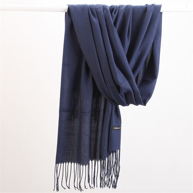 Pure cashmere scarf, soft and warm women's accessory, perfect for cold weather.