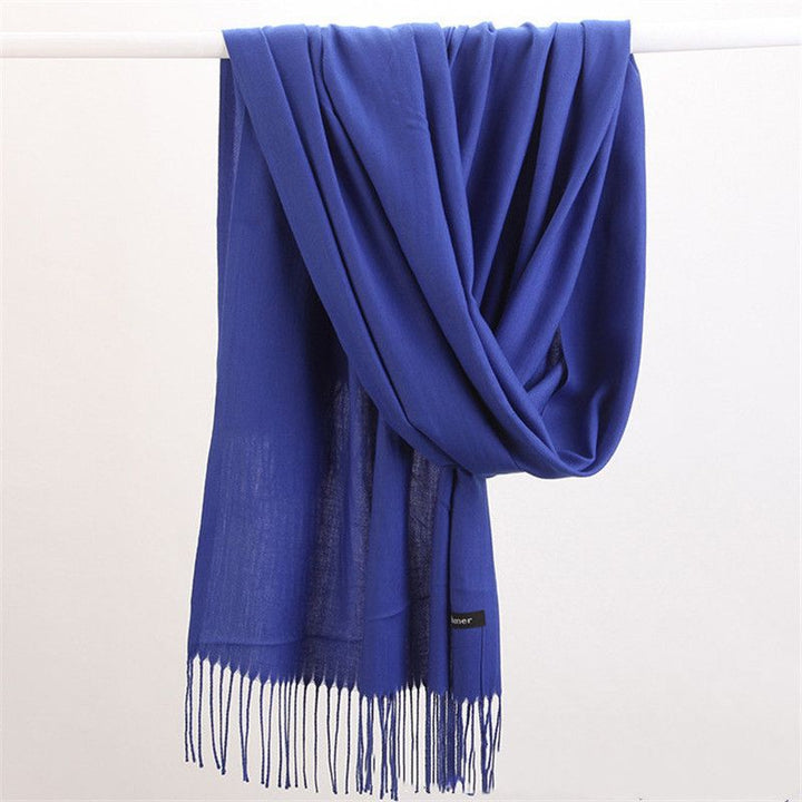 Soft knit cashmere scarf, beautiful texture detail, warm and stylish women's winter fashion.