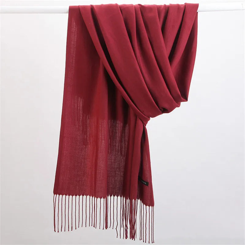 Chic cashmere scarf, warm winter fashion accessory, adds elegance to any outfit.