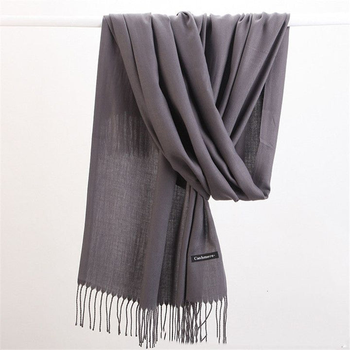 Indulgent cashmere scarf, soft knit luxury wrap, essential for elegant winter style.