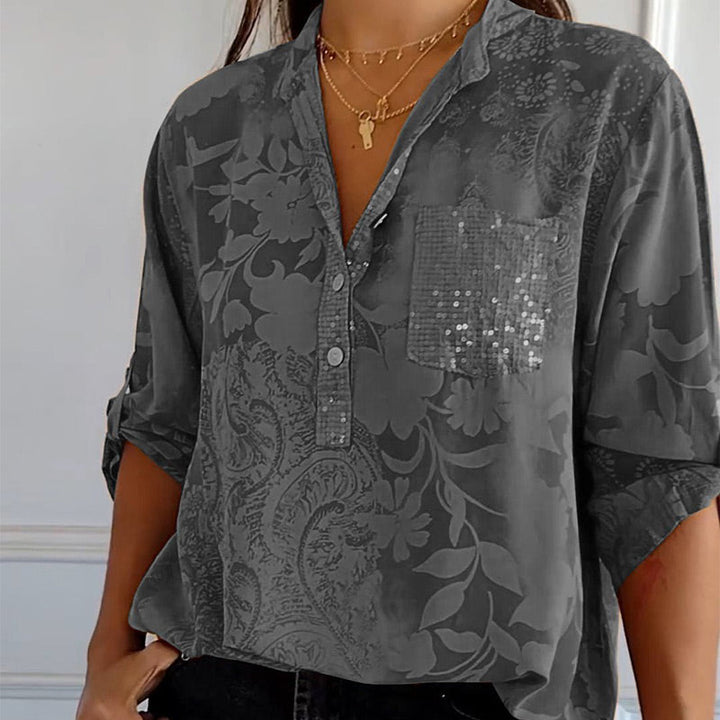Lightweight V-neck button-down summer blouse for women, stylish spring fashion, offering a casual elegant look.