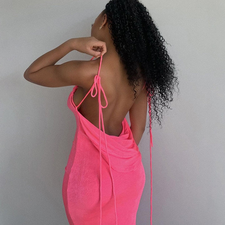 Chic Fayen low back long dress, perfect for a wedding guest or special occasion party.