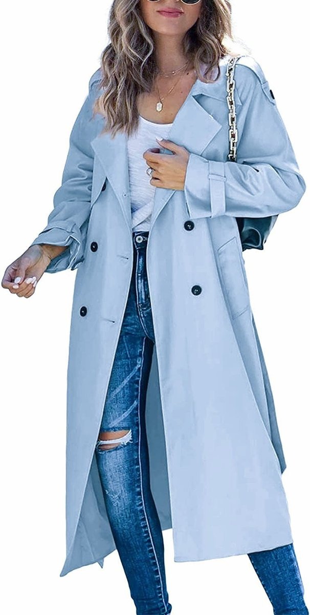 Fashionable women's oversized double-breasted trench, a stylish fall fashion essential with a tie belt.
