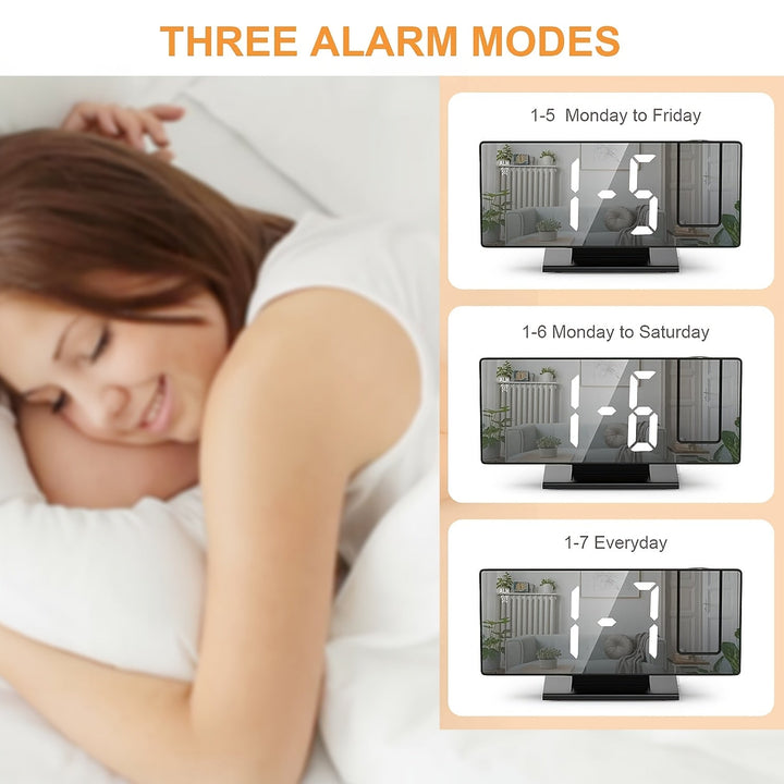 Close-up of LED projection alarm clock showing bright digital time and accessible snooze button.