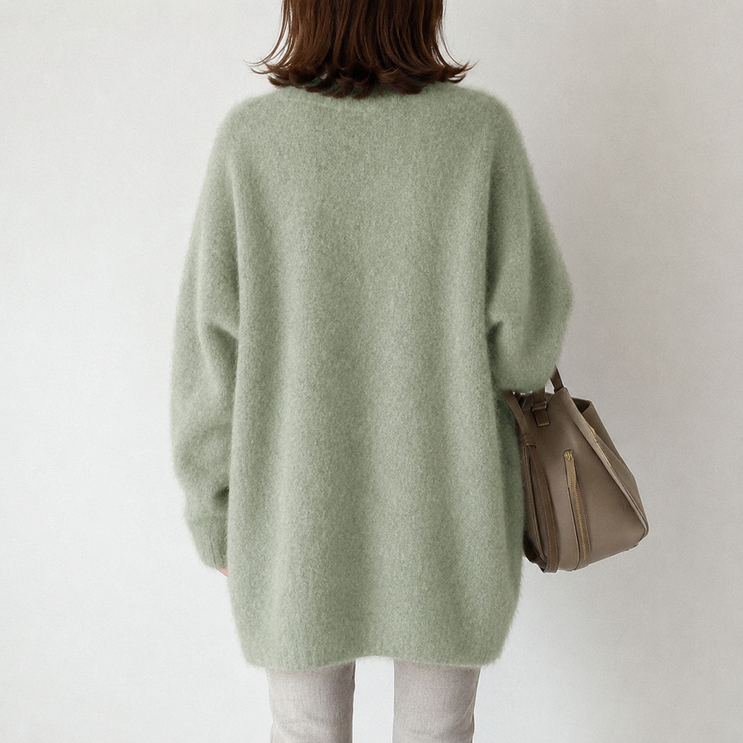 Chic women's mid-length button cardigan, perfect for versatile everyday and elegant styling.
