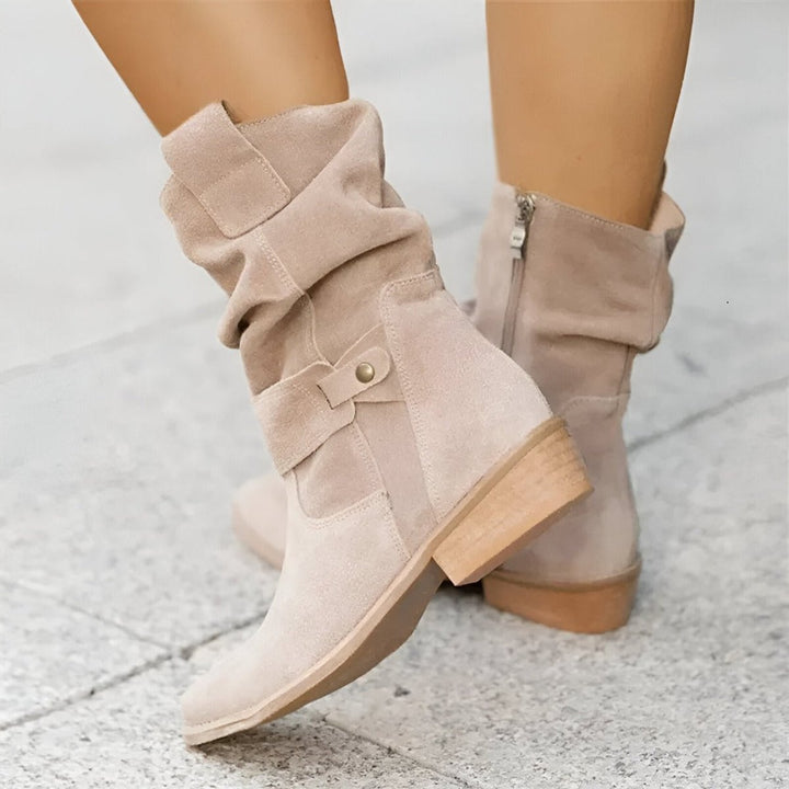 Casual yet elegant women's knee-high slouchy boots with a comfortable block heel; perfect versatile winter footwear.