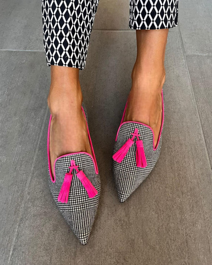 Elegant women's fringe loafers with a pointed toe. Comfortable slip-on shoes, perfect for office wear & daily fashion.