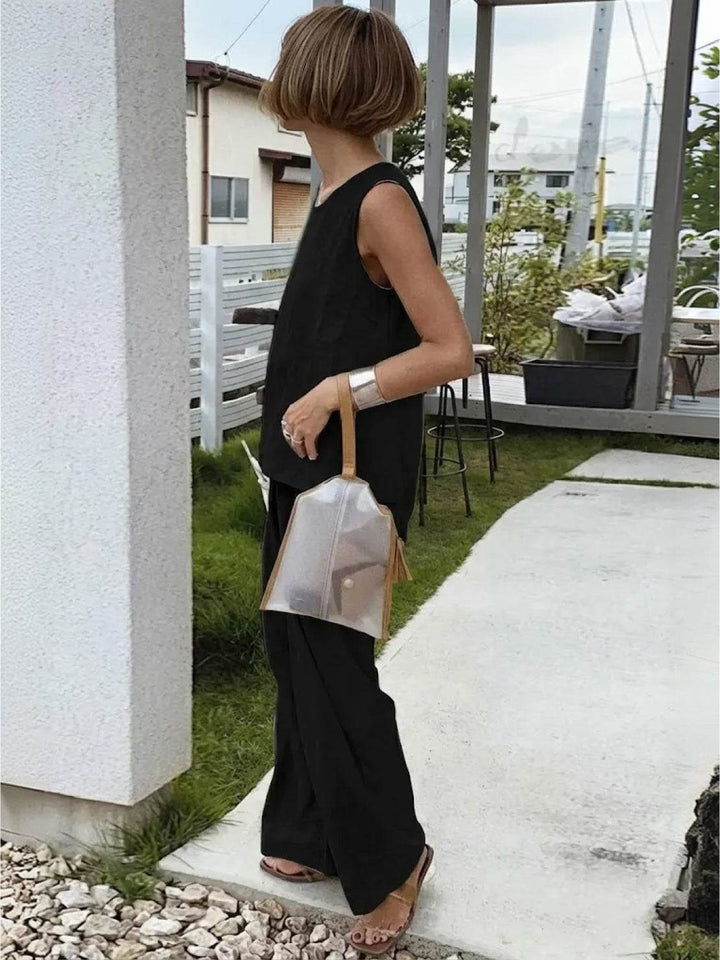 Coordinated women's outfit: sleeveless tank and wide-leg pants set for chic comfort & summer fashion.