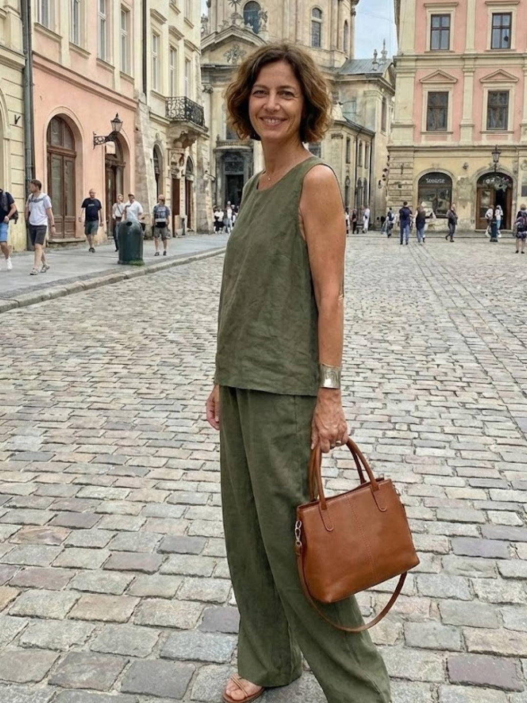 Versatile women's sleeveless tank and wide-leg pants set for casual wear or dressed-up spring looks.