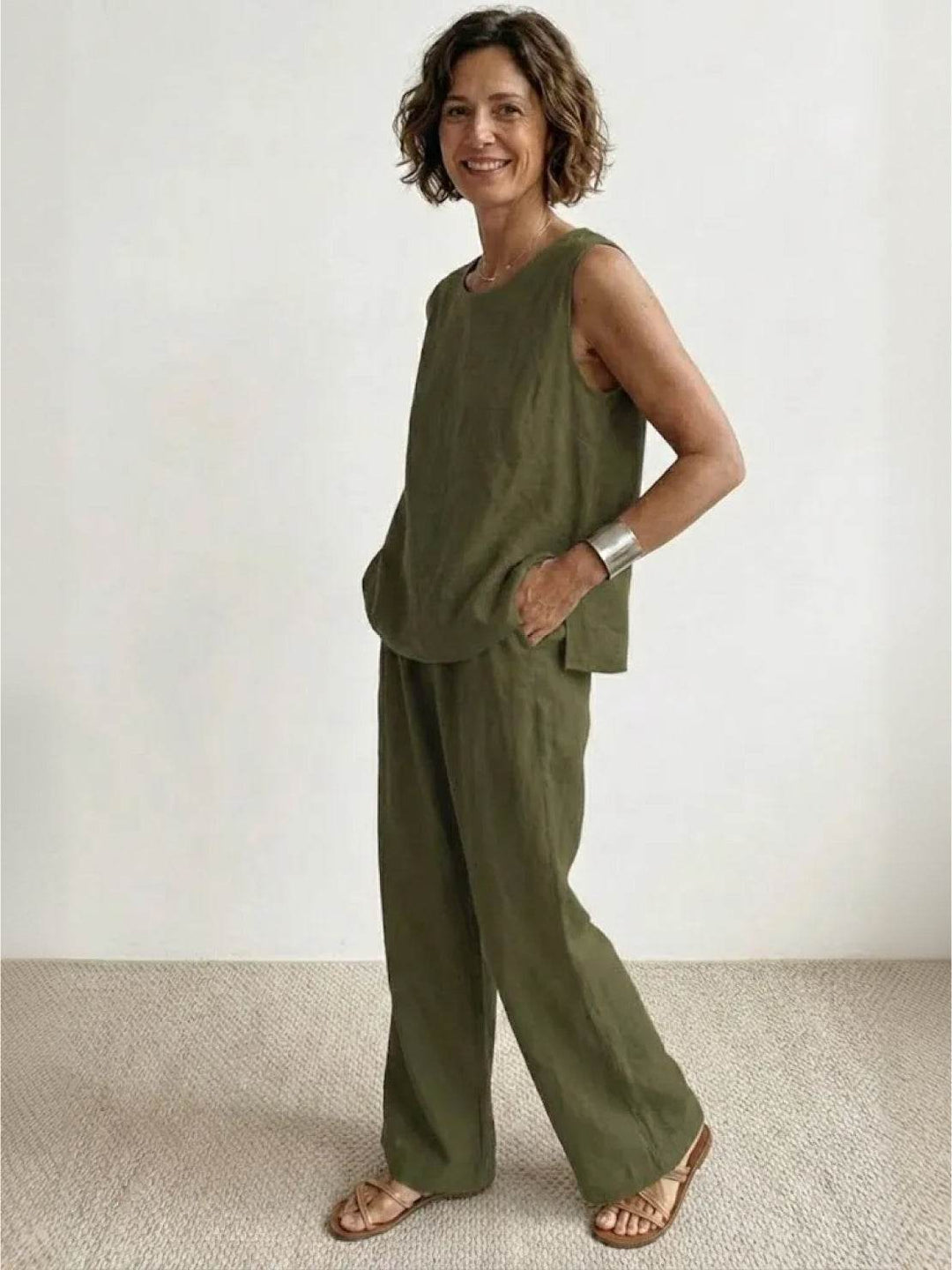 Woman modeling a comfortable sleeveless tank & wide-leg pant set, ideal for spring fashion & everyday wear.