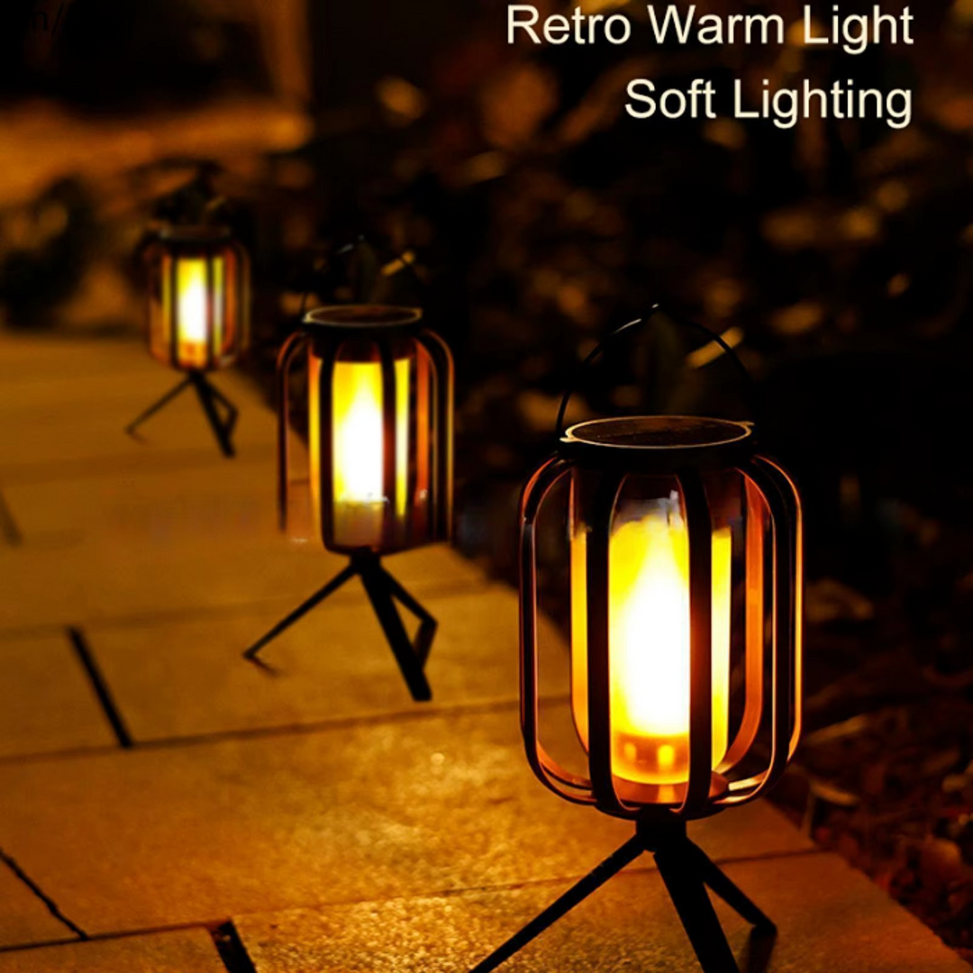 Weatherproof LED outdoor lantern, solar & USB rechargeable, creates ambient flickering light for any garden or patio.