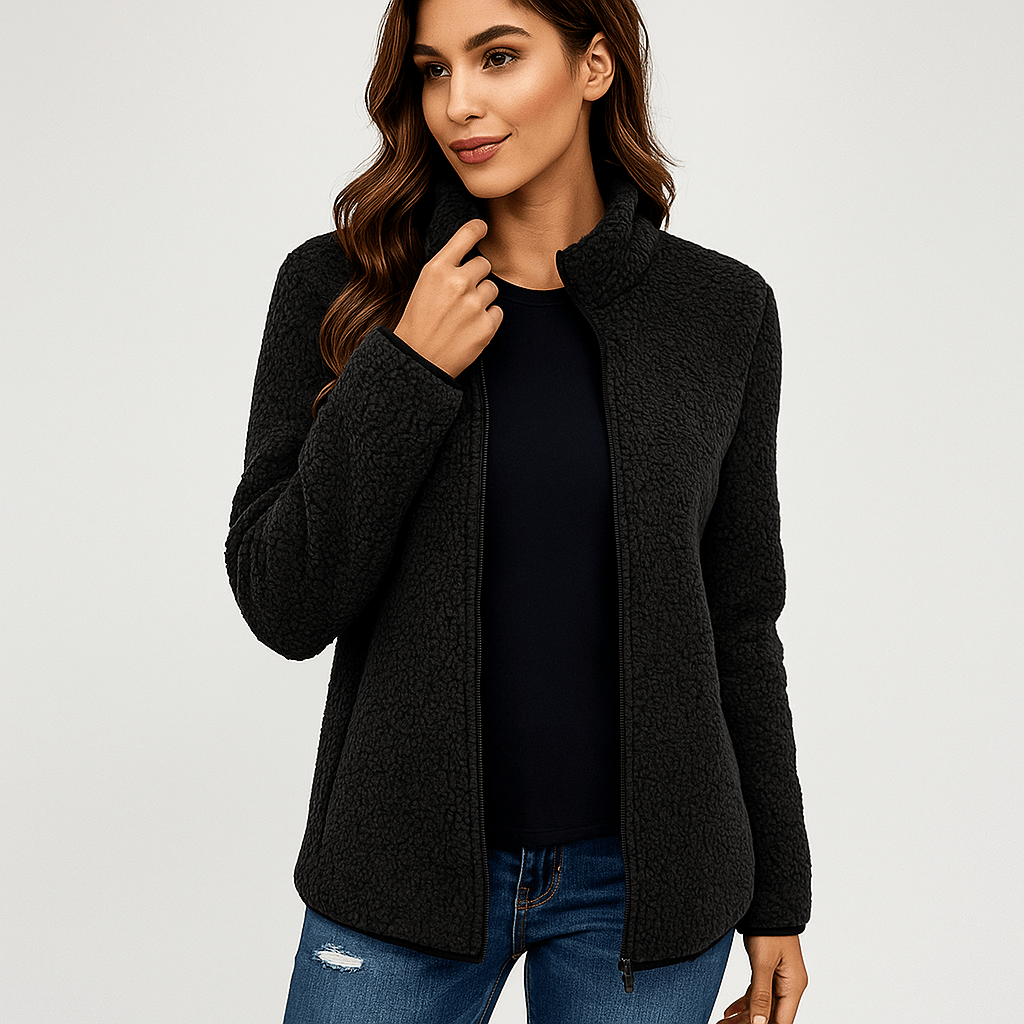 Woman wearing a cozy insulated jacket outdoors, stylish & warm outerwear for fall and winter adventures.