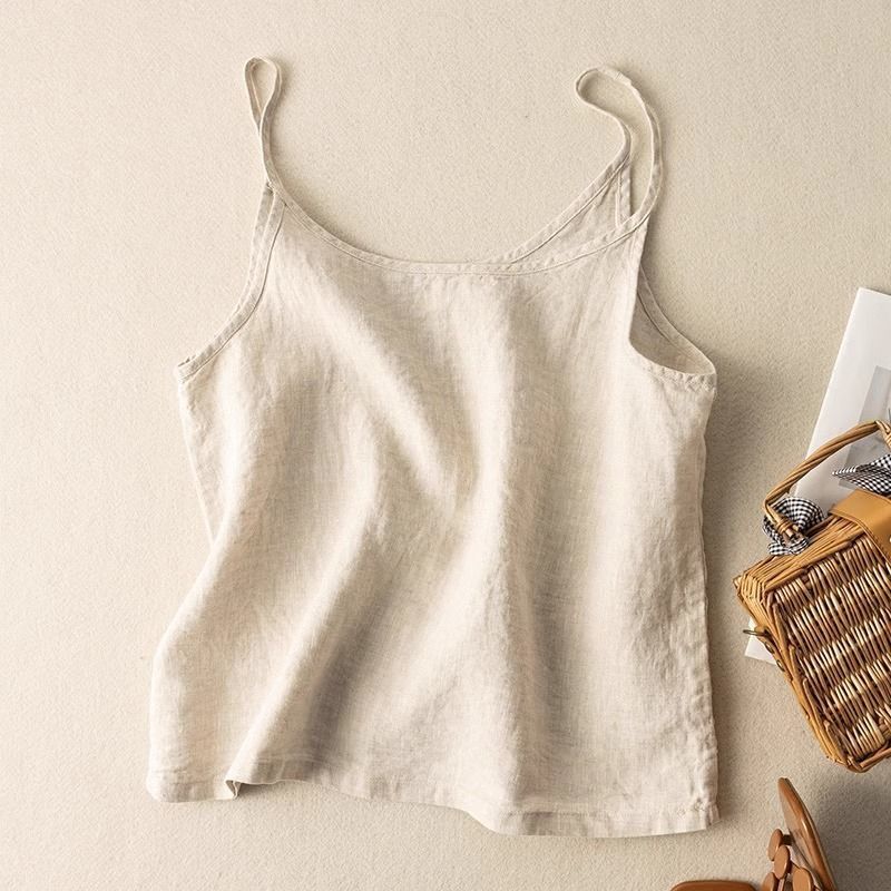 Women's flowy scoop neck camisole top with spaghetti straps, perfect for summer layering and comfort.