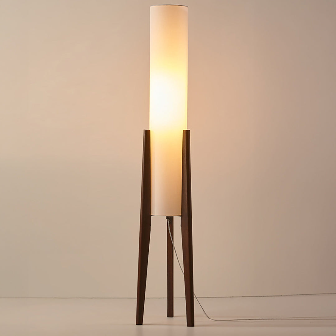 Scandinavian wood floor lamp with natural fabric shade, perfect for modern living room decor.