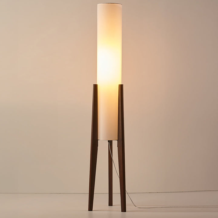 Scandinavian wood floor lamp with natural fabric shade, perfect for modern living room decor.