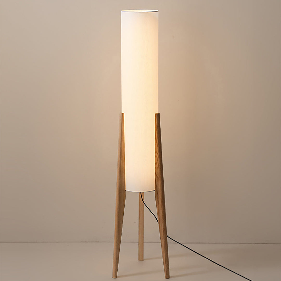 Stylish Scandinavian floor lamp featuring a sturdy wooden base and soft fabric shade, ideal for contemporary homes.