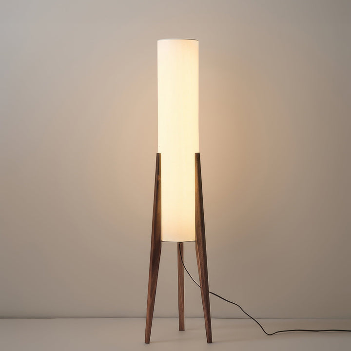 Versatile unisex Scandinavian wood floor lamp with fabric shade, a stylish and functional addition to any room.