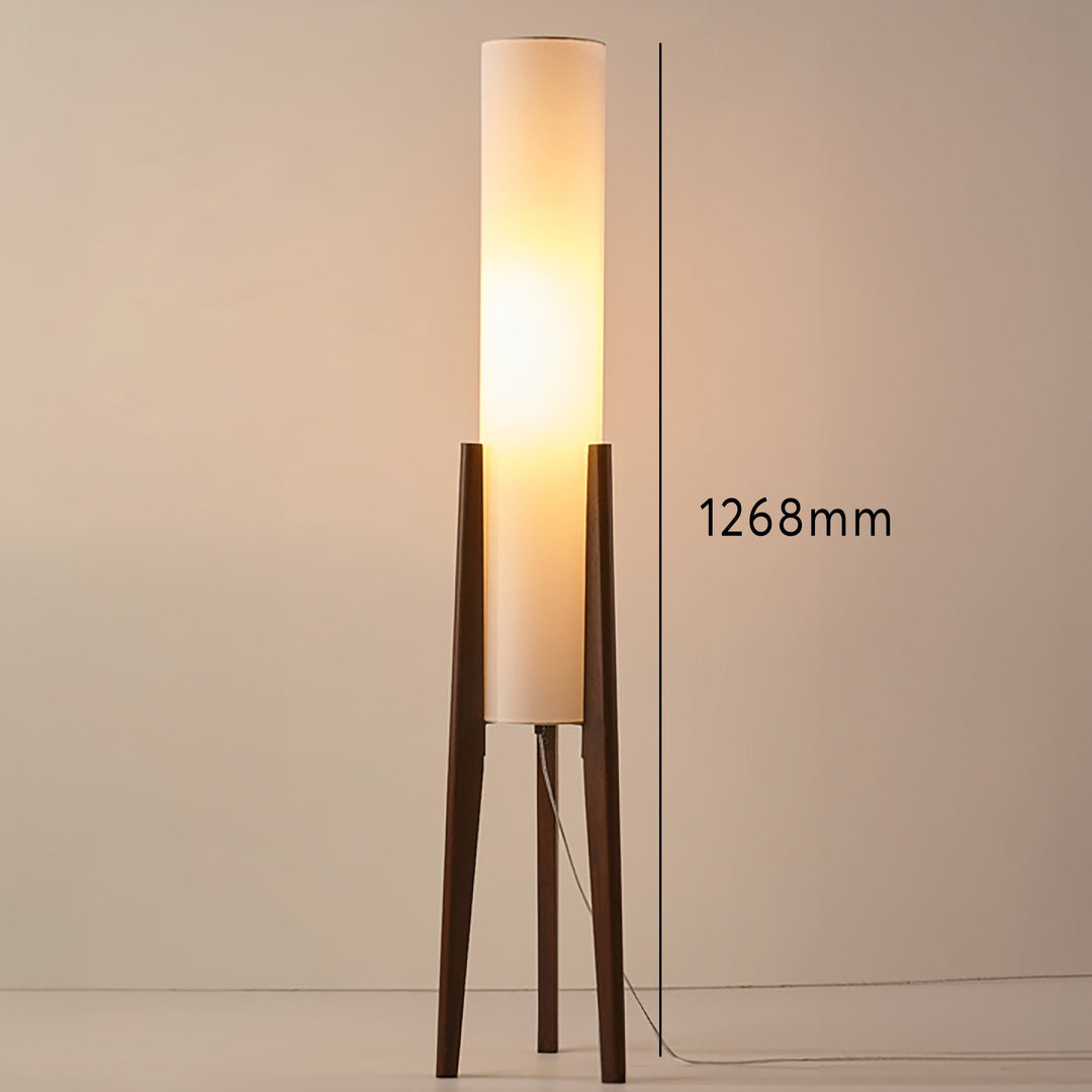 Natural wood floor lamp with a clean, minimalist design and a soft fabric shade, a perfect Scandinavian accent.