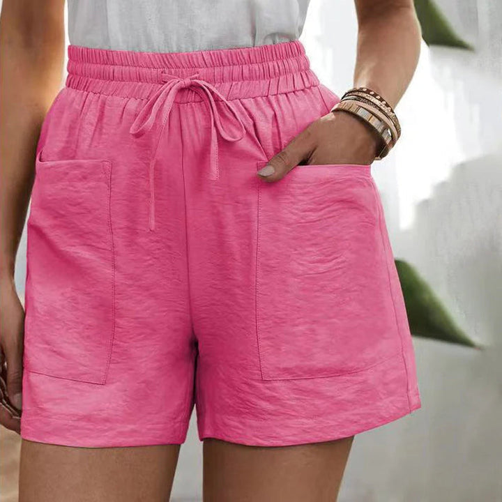 Casual women's summer shorts with convenient side pockets, perfect for carrying essentials on warm days.