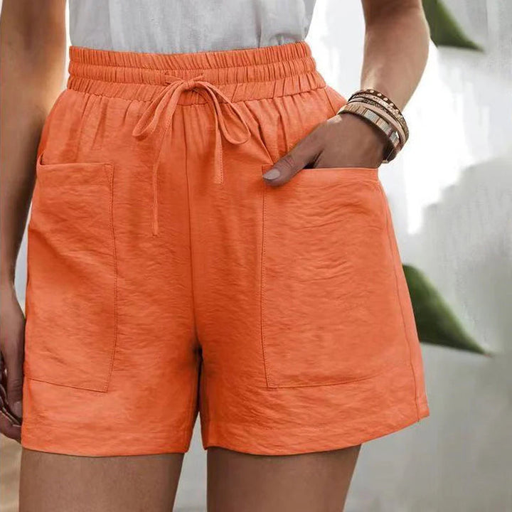 Chic women's summer shorts, versatile for everyday wear; relaxed fit with practical pockets & drawstring.