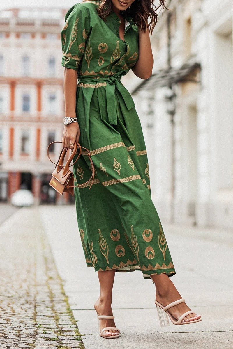 Stylish women's belted midi cocktail dress, featuring a sophisticated geometric print & flattering silhouette for parties.