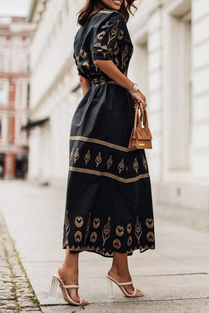 Women's elegant midi cocktail dress with a vibrant geometric print & stylish belt. Perfect for any special occasion.