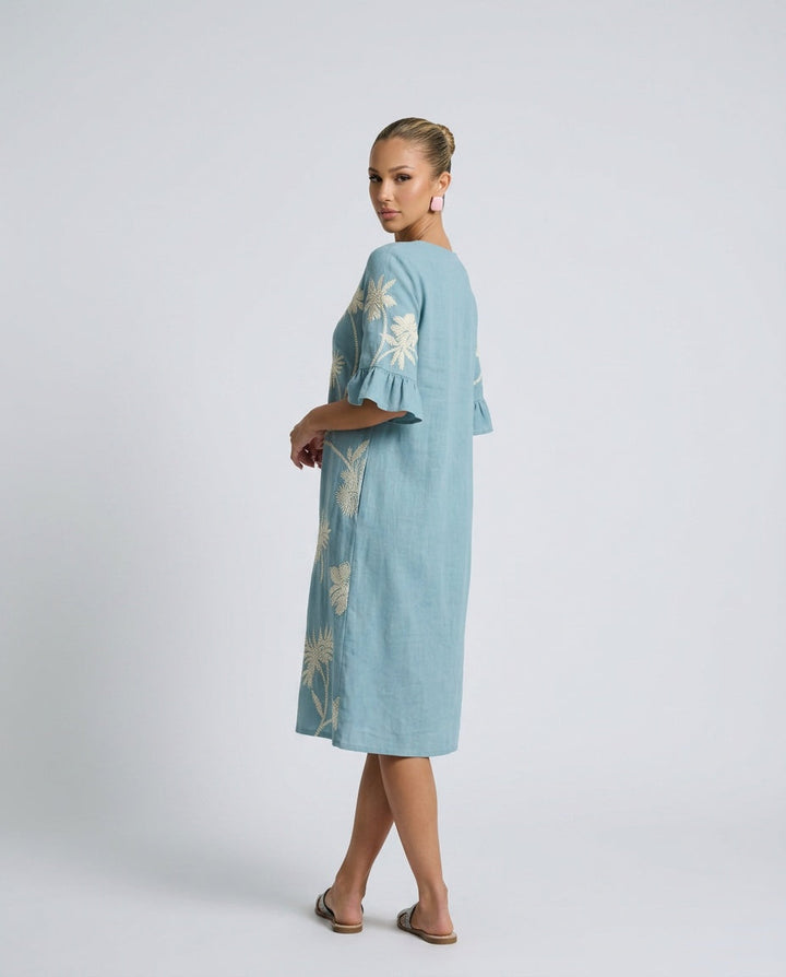 Stylish women's embroidered floral midi dress with relaxed fit and V-neck, ideal for summer elegance.
