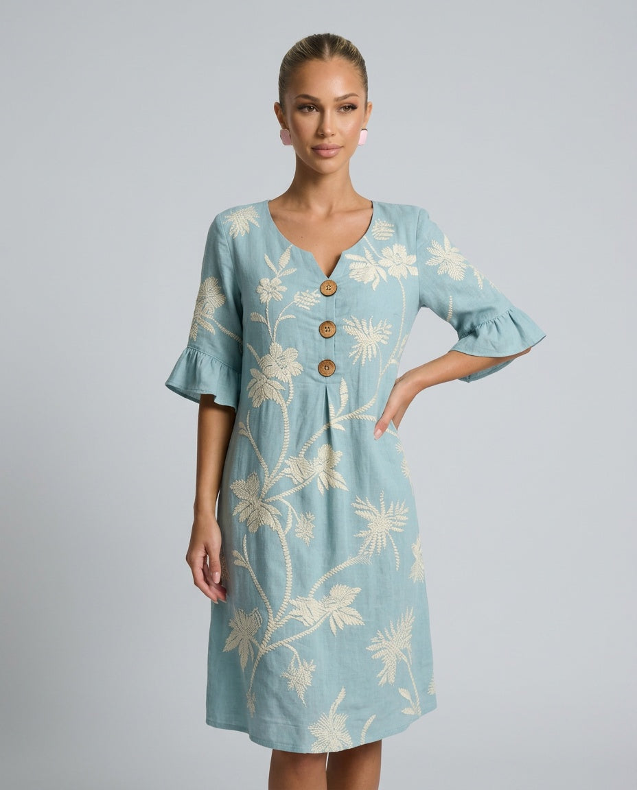 Casual summer women's midi dress featuring intricate floral embroidery, V-neck, & flutter sleeves for a chic look.
