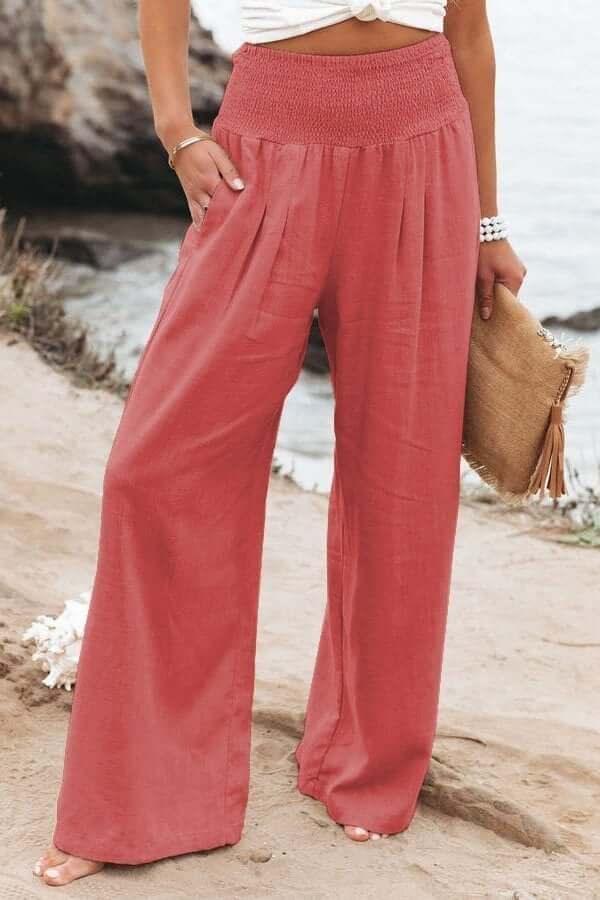 Elegant women's wide-leg smocked pants, versatile for casual outings, resort wear, or a chic summer look.