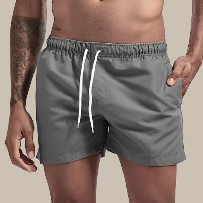 Men's summer fashion relaxed fit swim shorts with drawstring, perfect for beach adventures & pool.
