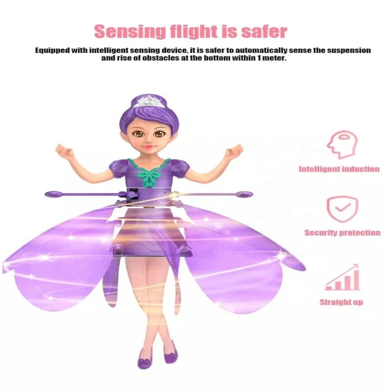 Happy child delightedly playing with a magical flying doll, controlling its LED lights & flight with gestures.
