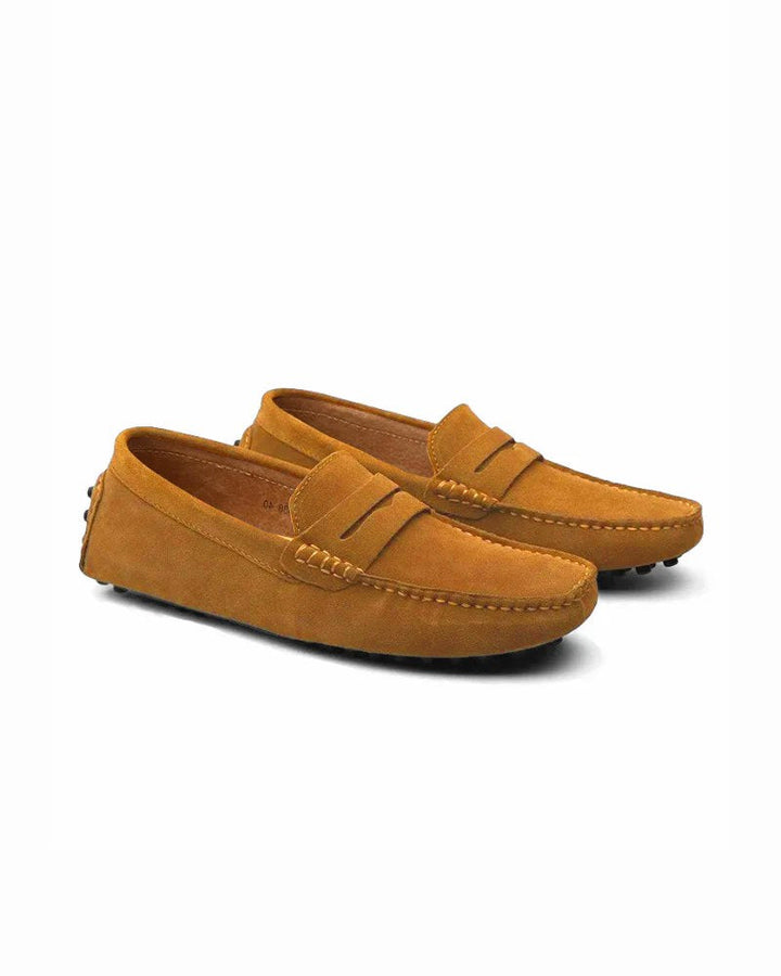 Versatile men's suede-effect slip-on shoes, perfect for dressing up or casual comfort.