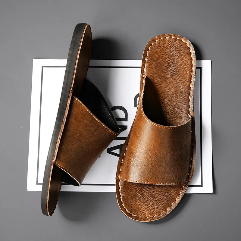 Men's beach slide sandals, single band for poolside style & warm weather comfort.
